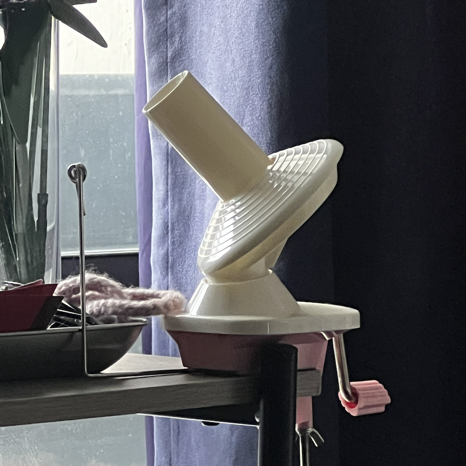 The sound of a yarn winder being turned