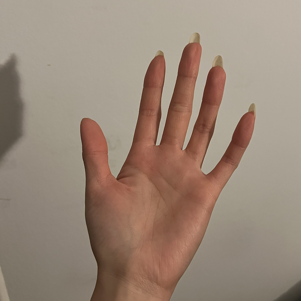 Using my hands tapping on a surface to mimic the sounds of drums