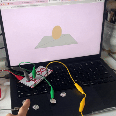 Using the tinfoil as buttons hooked up to arrow keys on the Makey Makey