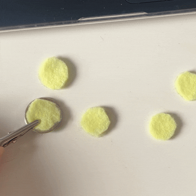 Using a dime underneath felt button to make it conductive